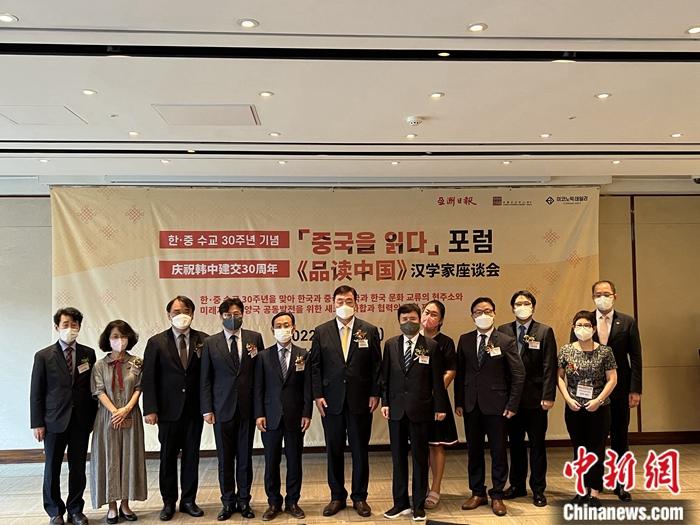 圖為活動(dòng)嘉賓合影。劉旭 攝
