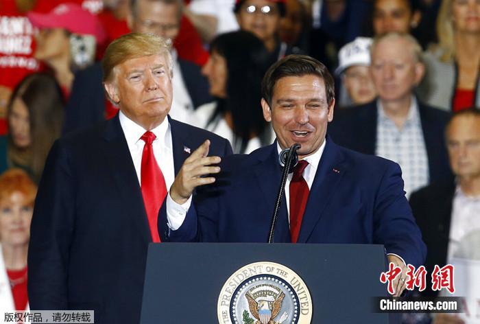 資料圖：特朗普與德桑蒂斯。