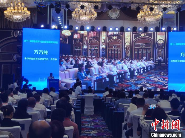 圖為第十一屆職業(yè)教育與城市發(fā)展高層對(duì)話會(huì)現(xiàn)場(chǎng)?！±類燮?攝